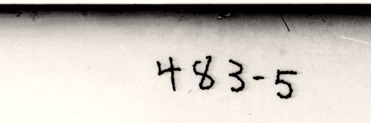 The handwritten file number 483-5