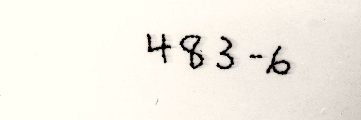The handwritten file number 483-6