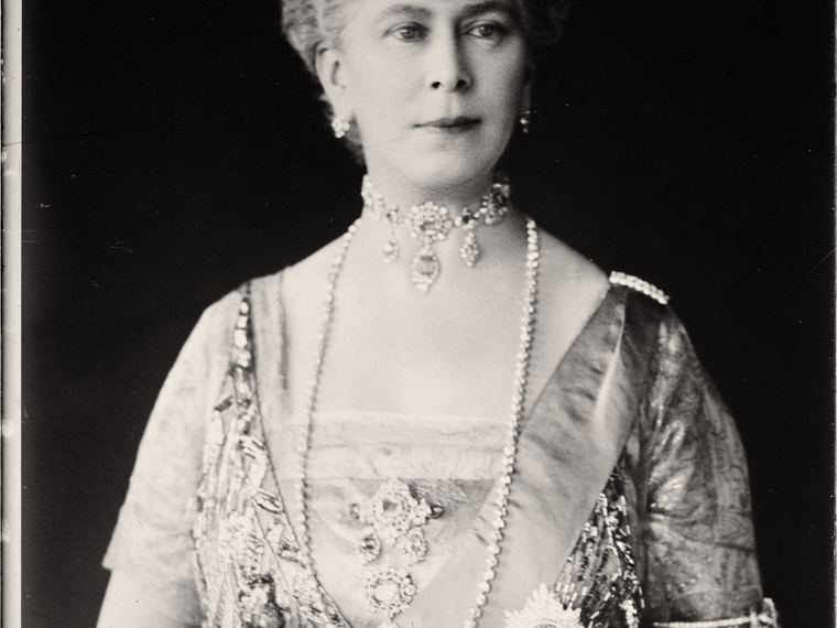 A portrait of Queen Mary in her tiara, her name handwritten in white on the dark top edge. Library of Congress ggbain.31282.