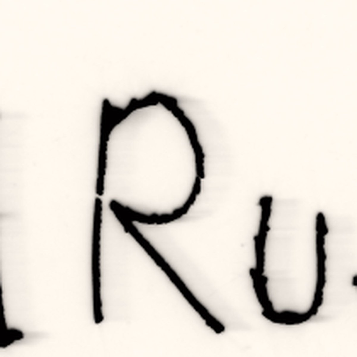 The letter R enlarged to the resolution the Library of Congress scan actually holds, soft at every edge